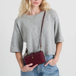 The Sak Iris Smartphone Wallet - Hand Crochet - Black Cherry Cozy Weave