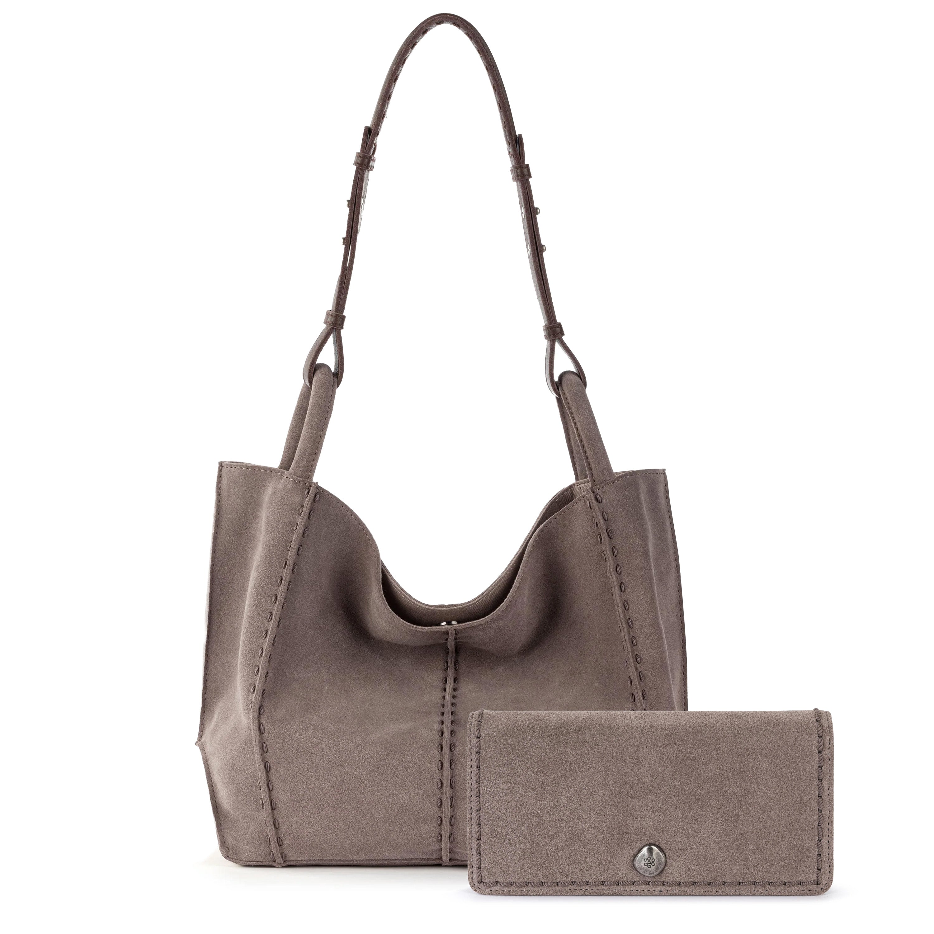 Taupe suede tote bag with dual handles and matching large wallet with metal button closure.